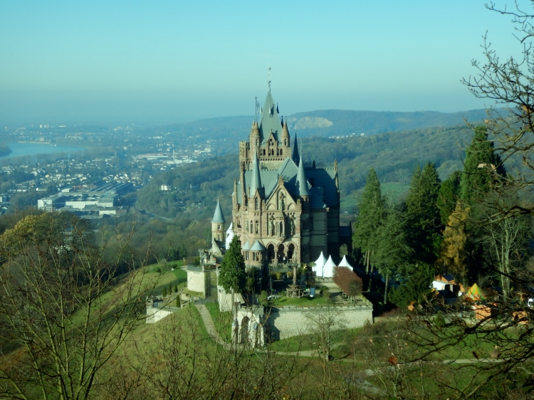 Real Disney castle Drachenfels in Konigswinter is illuminated at night in December