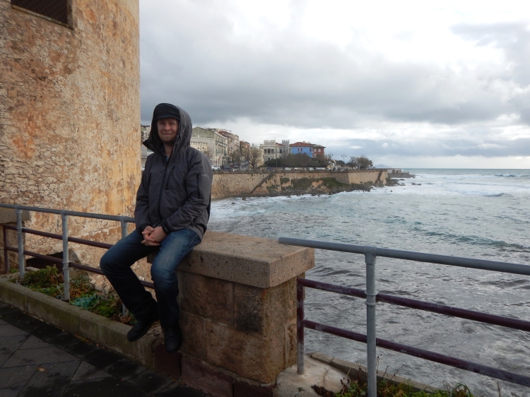 Jacob near the seaside in Alghero. A very defensible city!